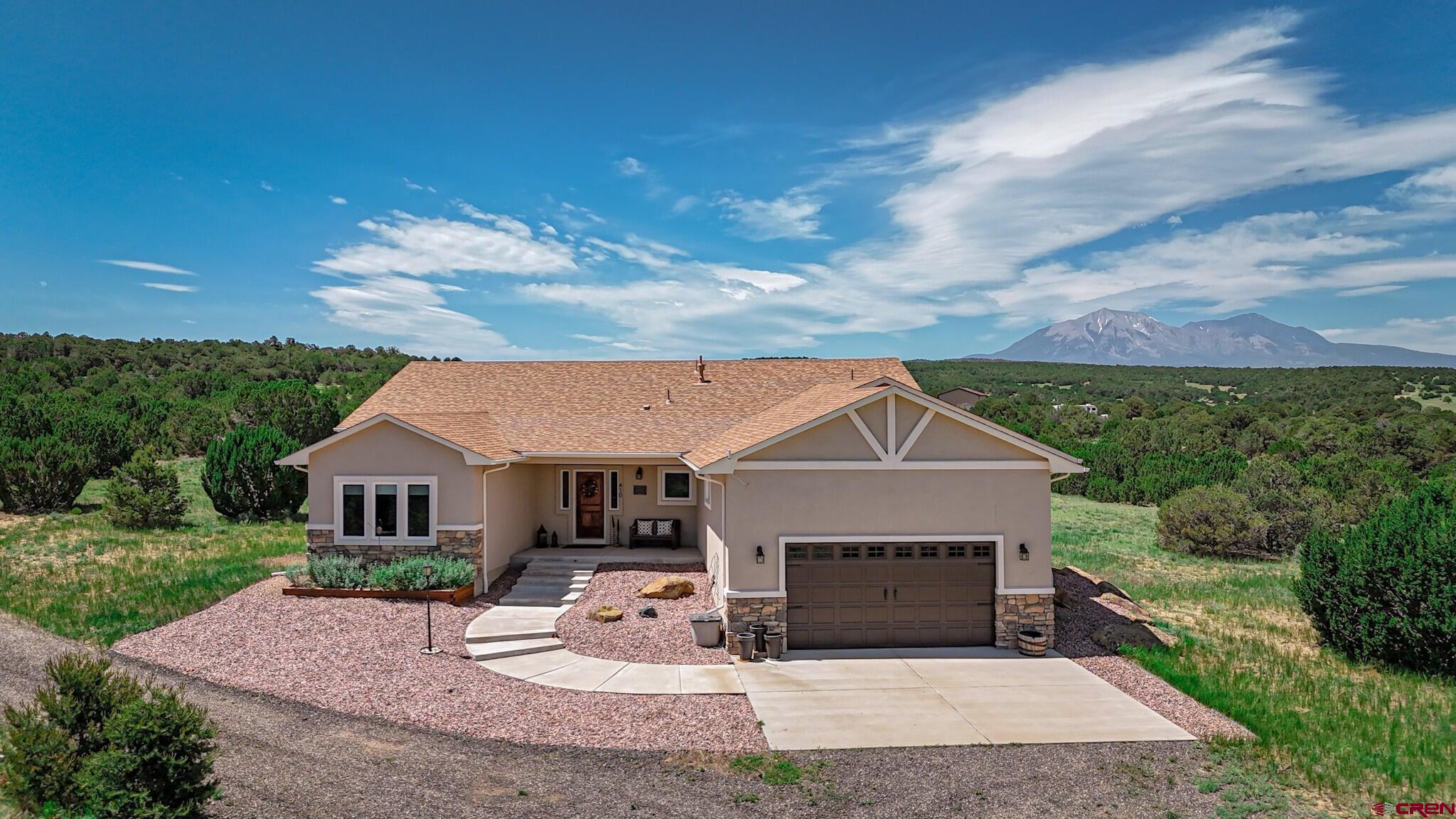 front view of a house with yard