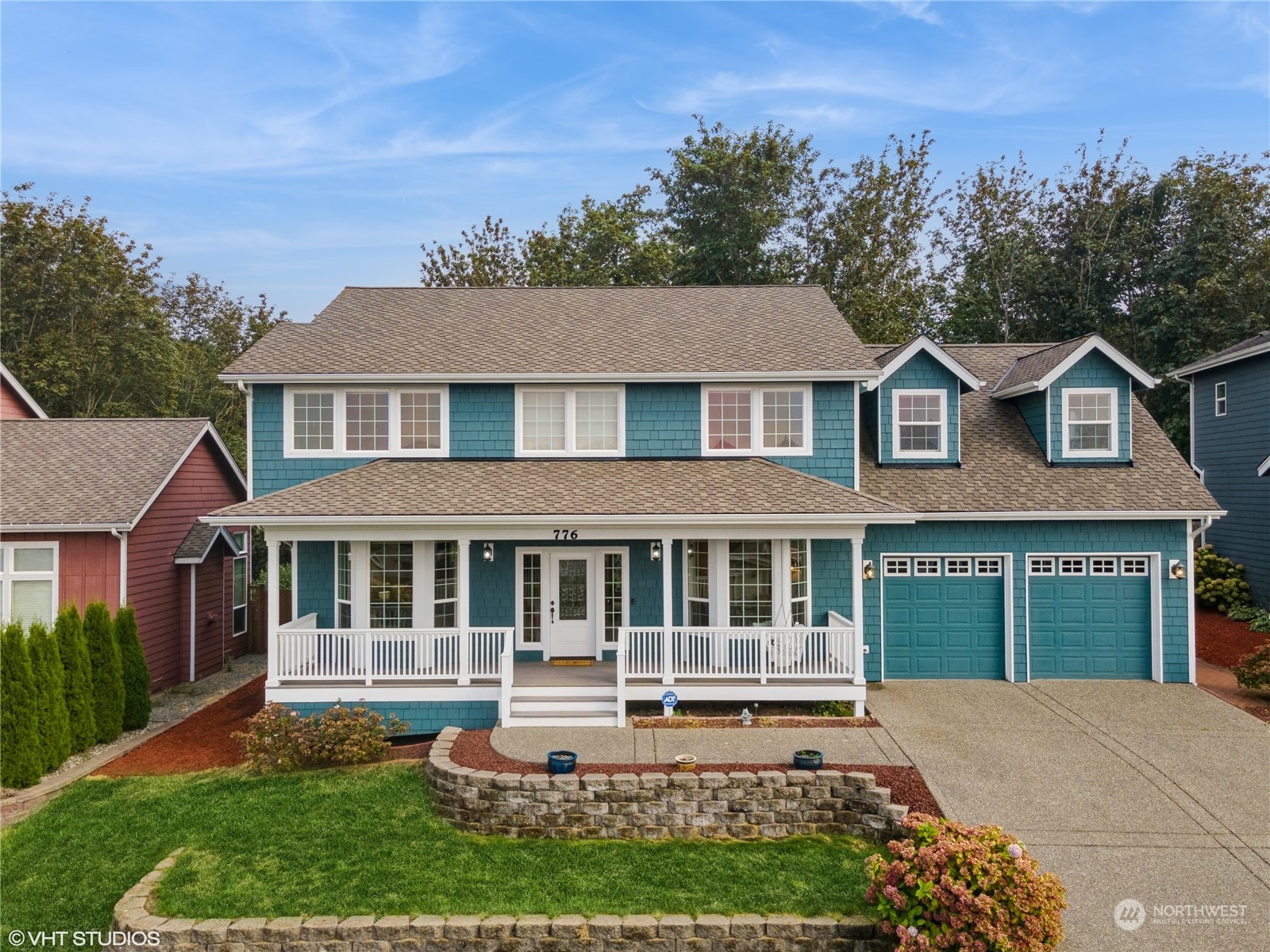 front view of a house with a yard