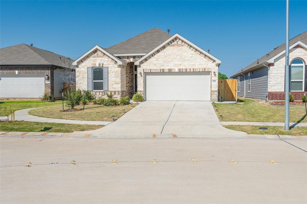 a view of outdoor space yard and front view of a house