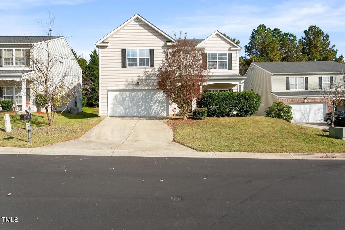 a view of house with outdoor space and street view