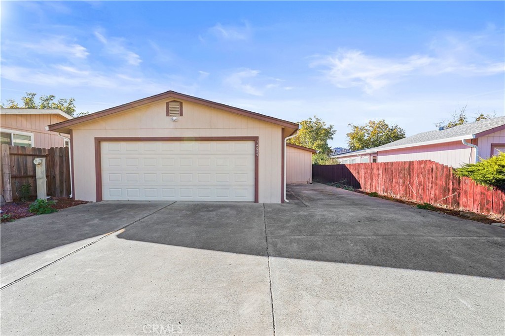 a front view of a house with a garage