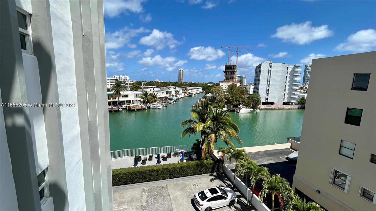 a view of a lake from a balcony