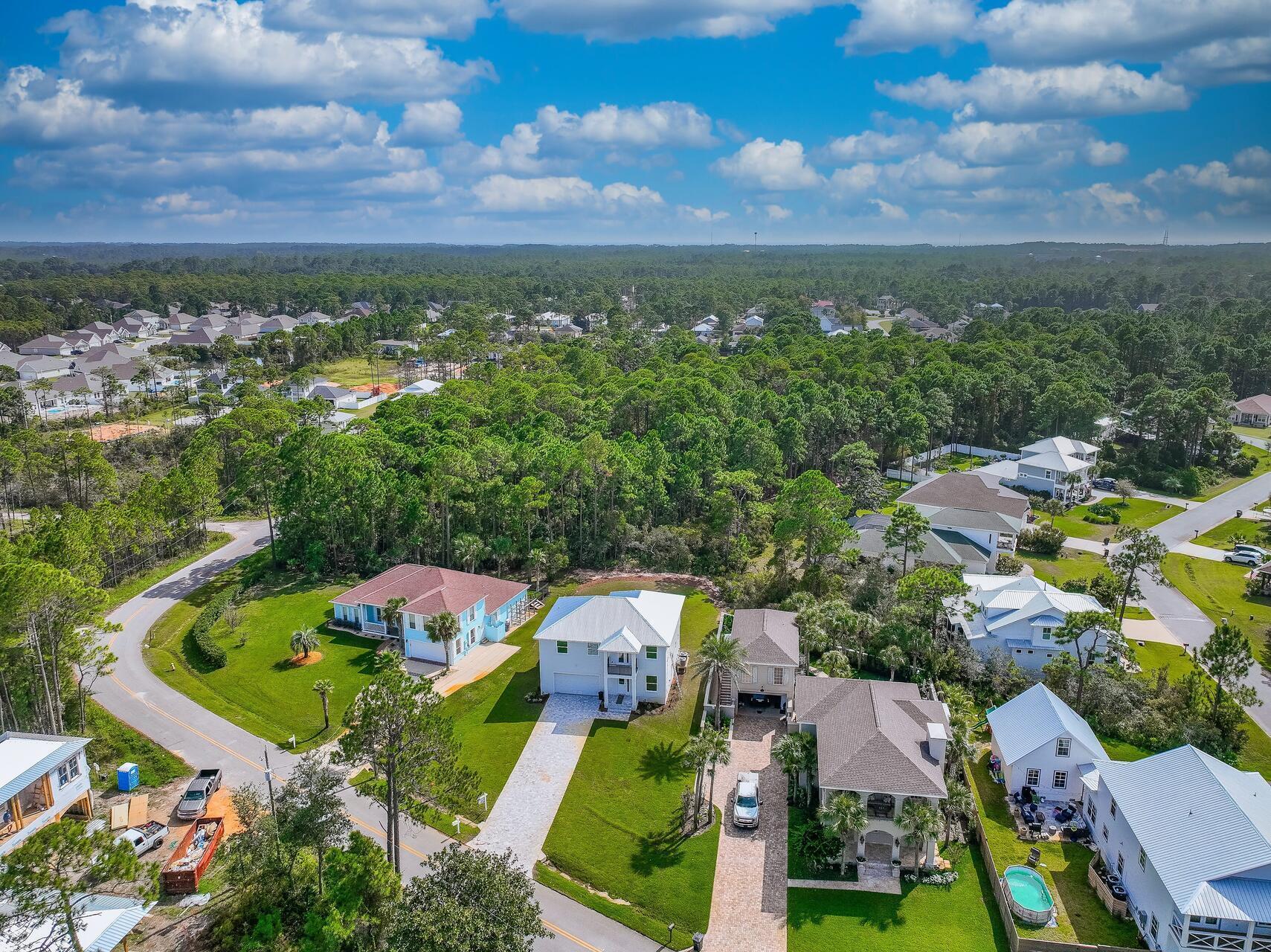 an aerial view of residential house with outdoor space