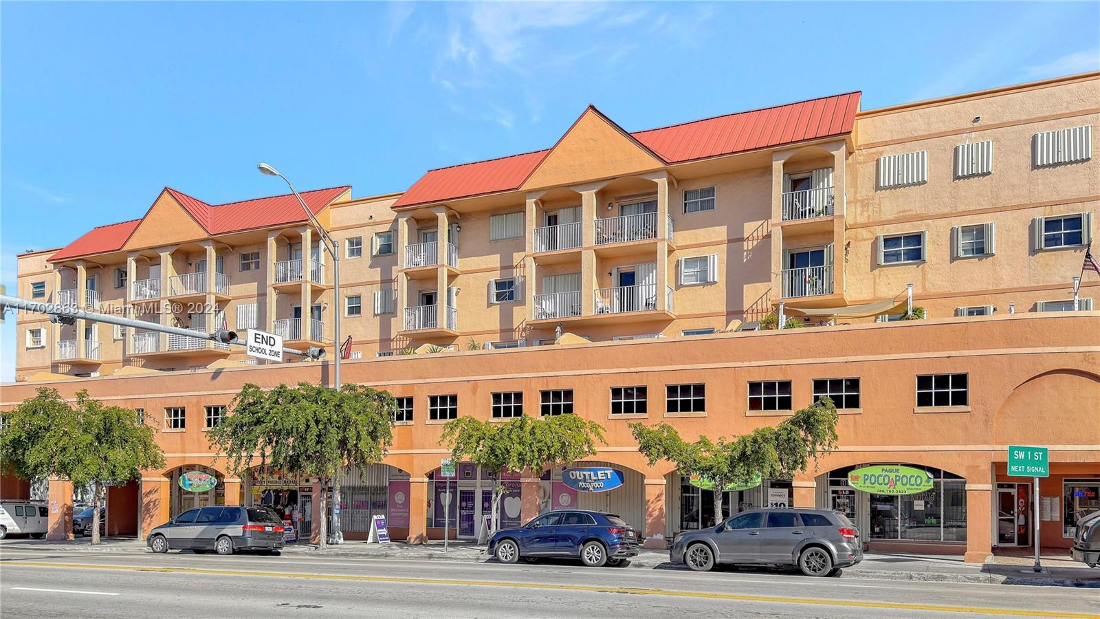 a front view of a building with street view