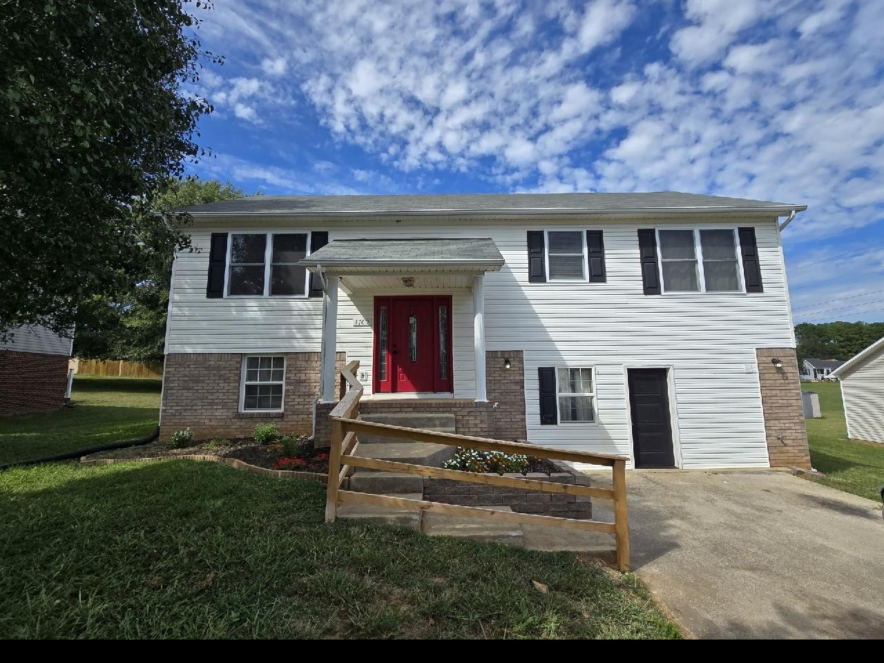 front view of house with a yard