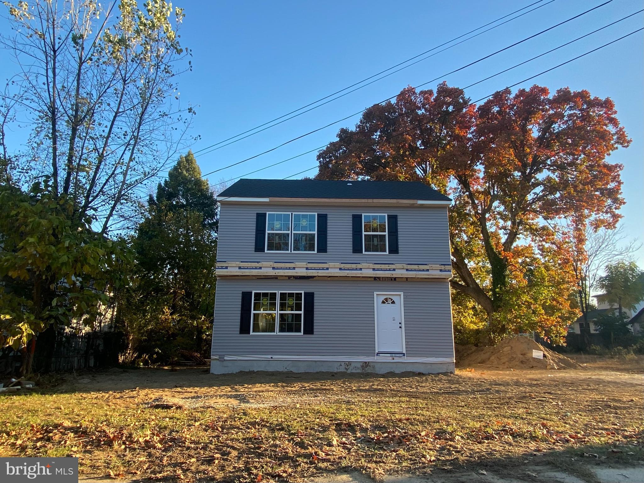 a front view of house with yard