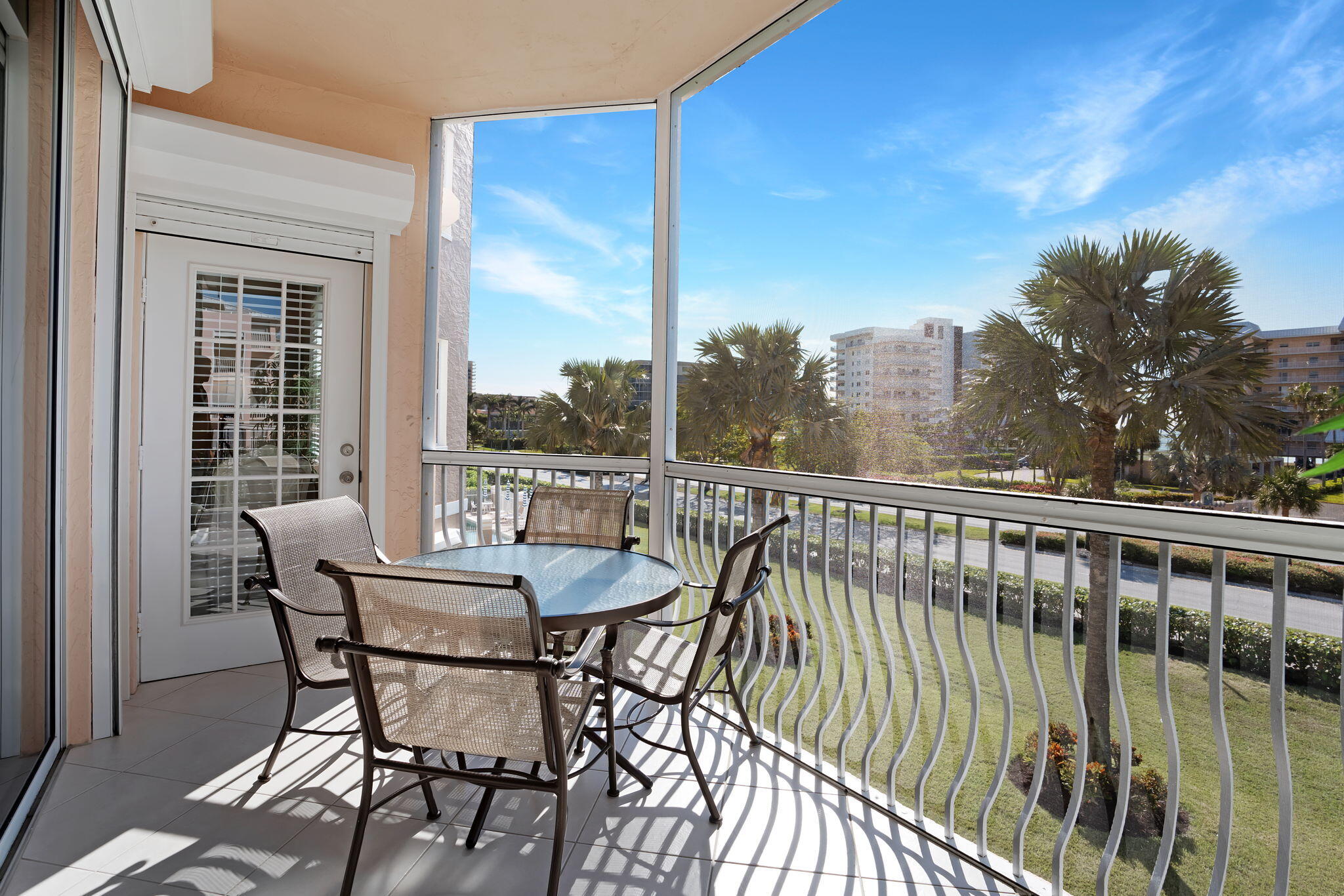 a view of a balcony with furniture