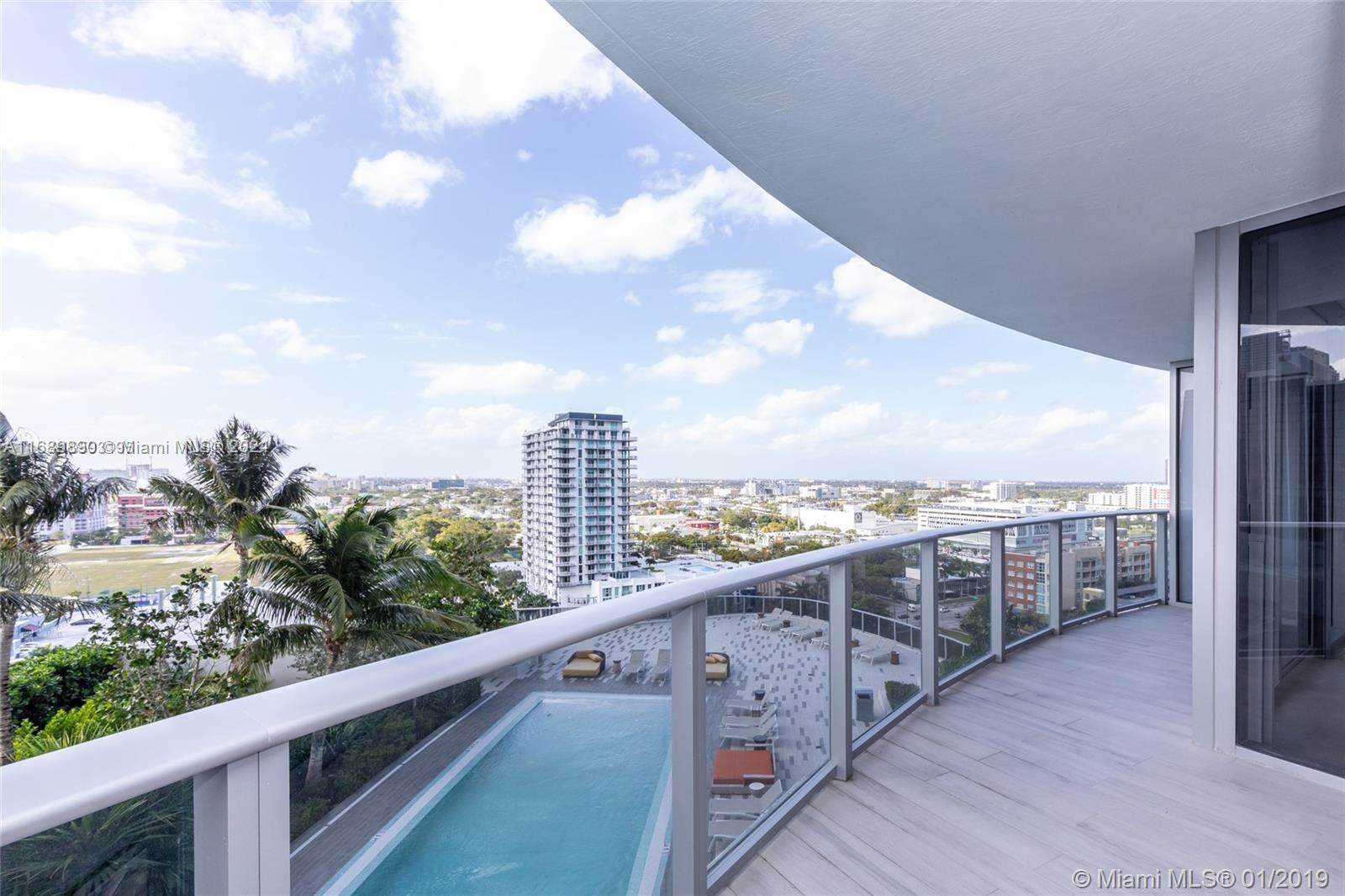 a view of a balcony with city view