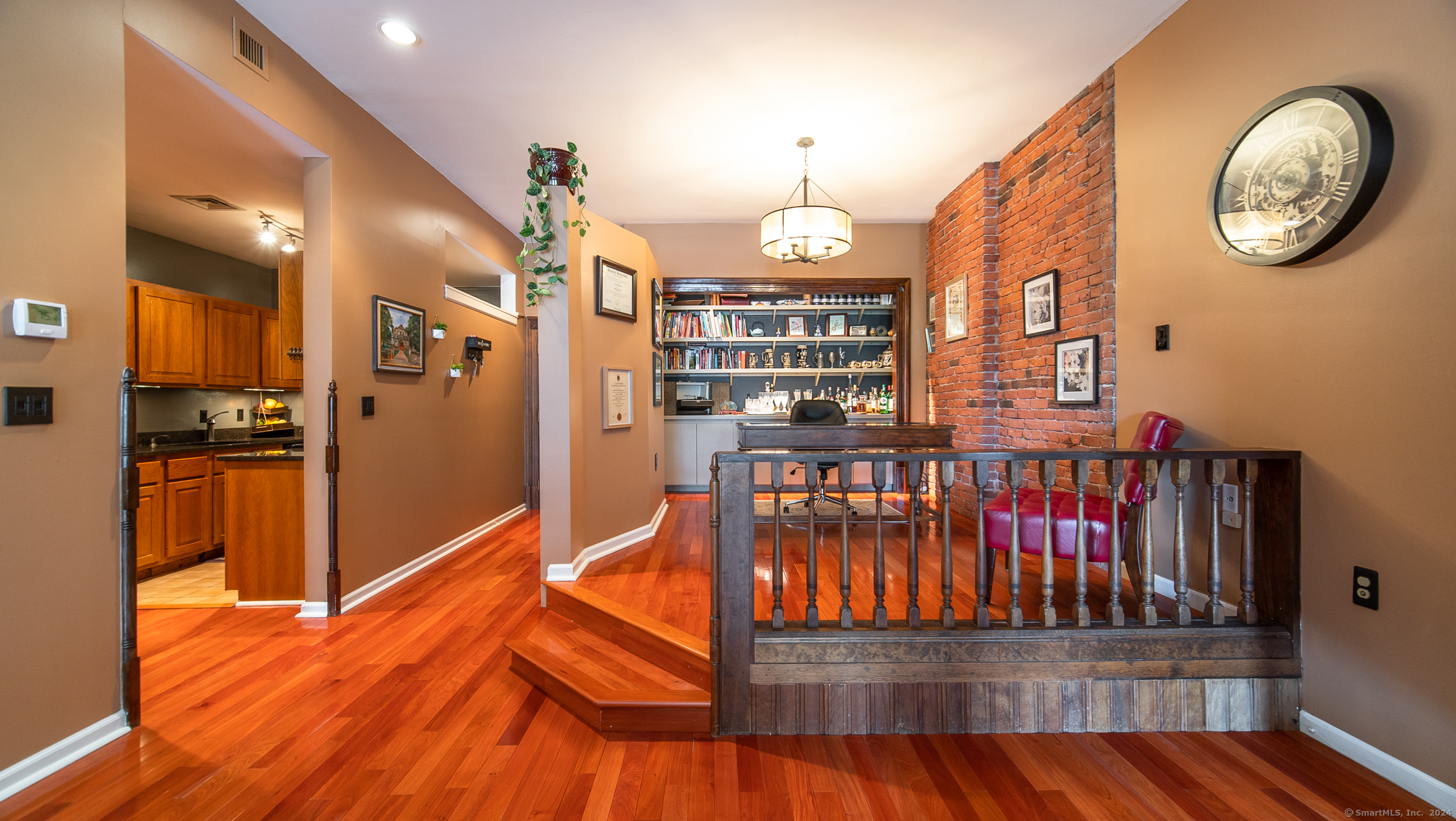 a view of entryway with wooden floor