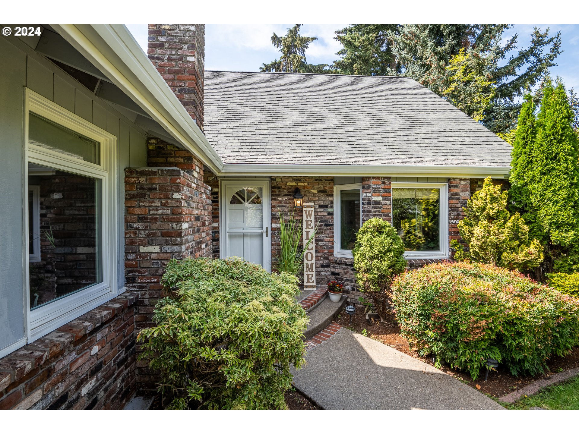 a house view with a garden space