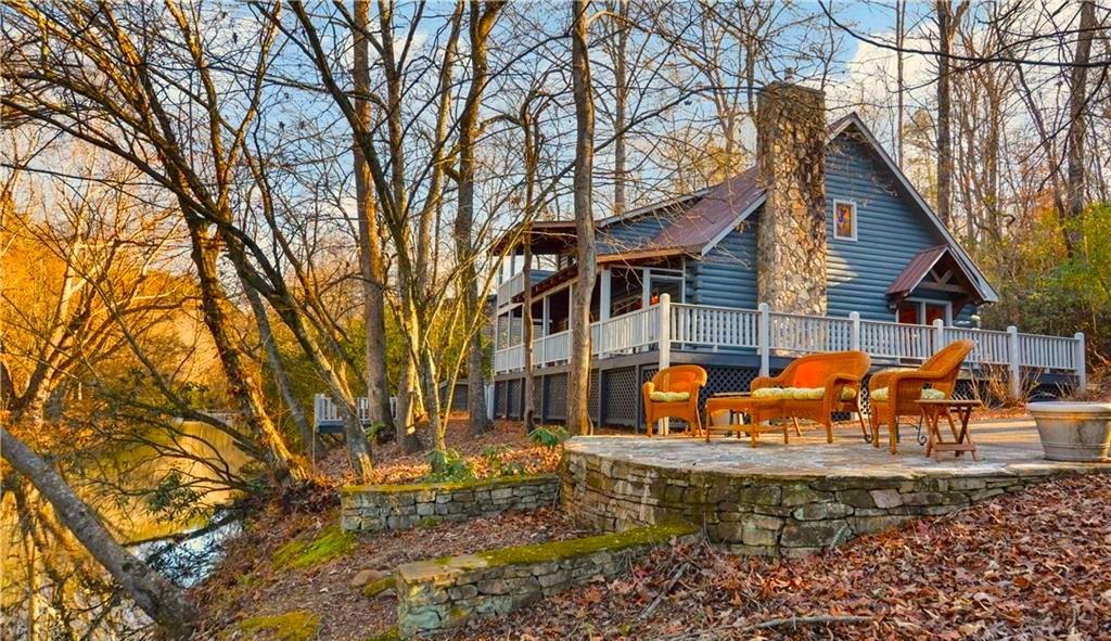 a backyard of a house with barbeque oven