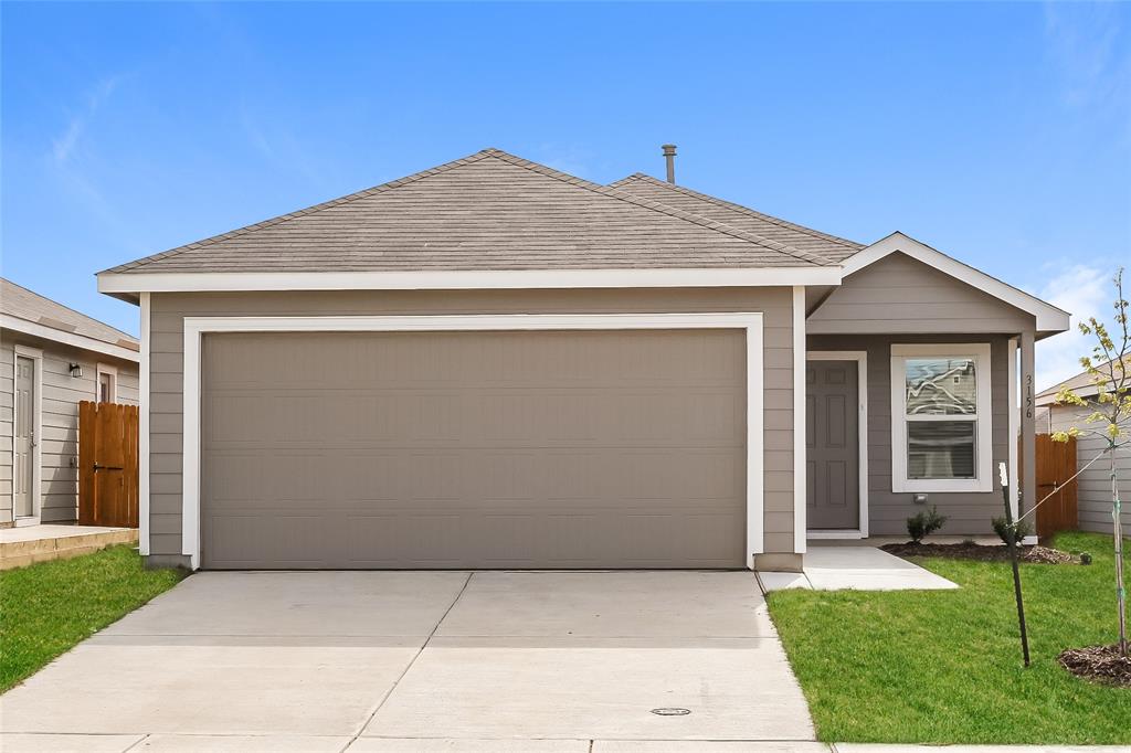 a front view of house with yard