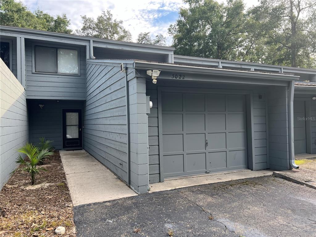 a view of a house with a garage