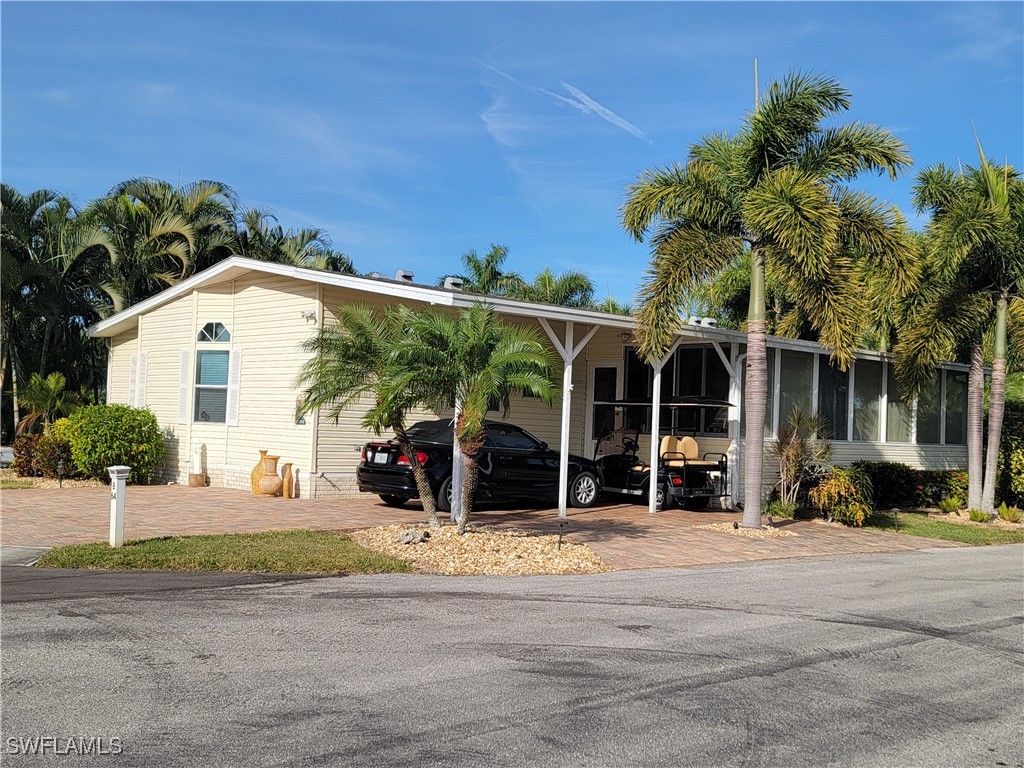 front view of a house with a patio