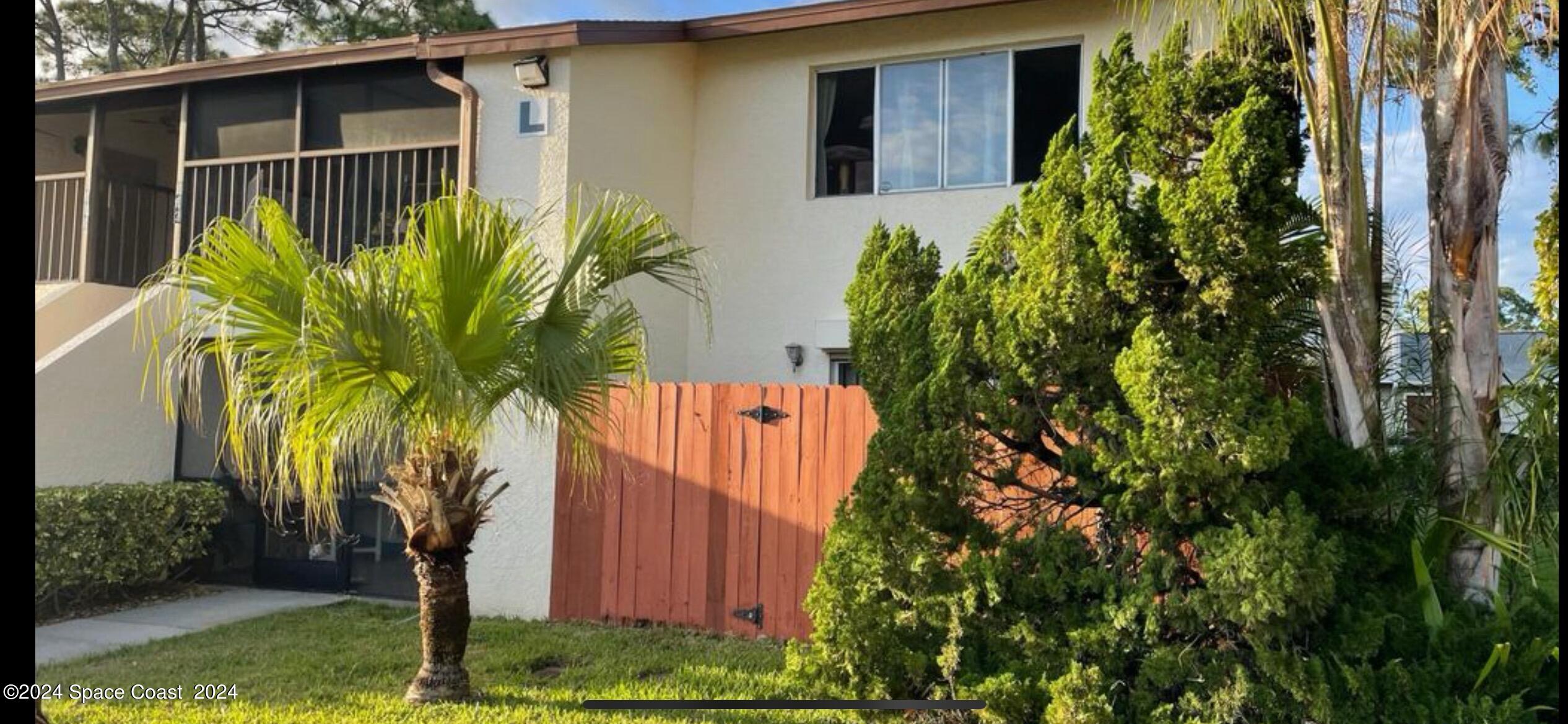 a plant is in front of a house