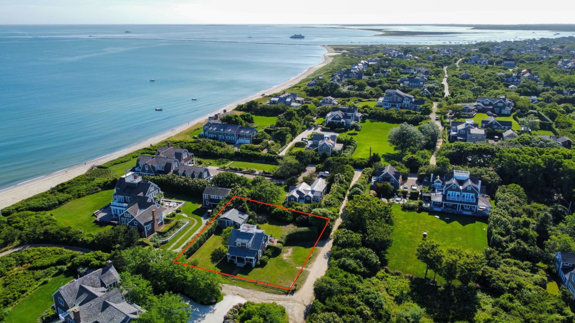 a view of a garden with an ocean