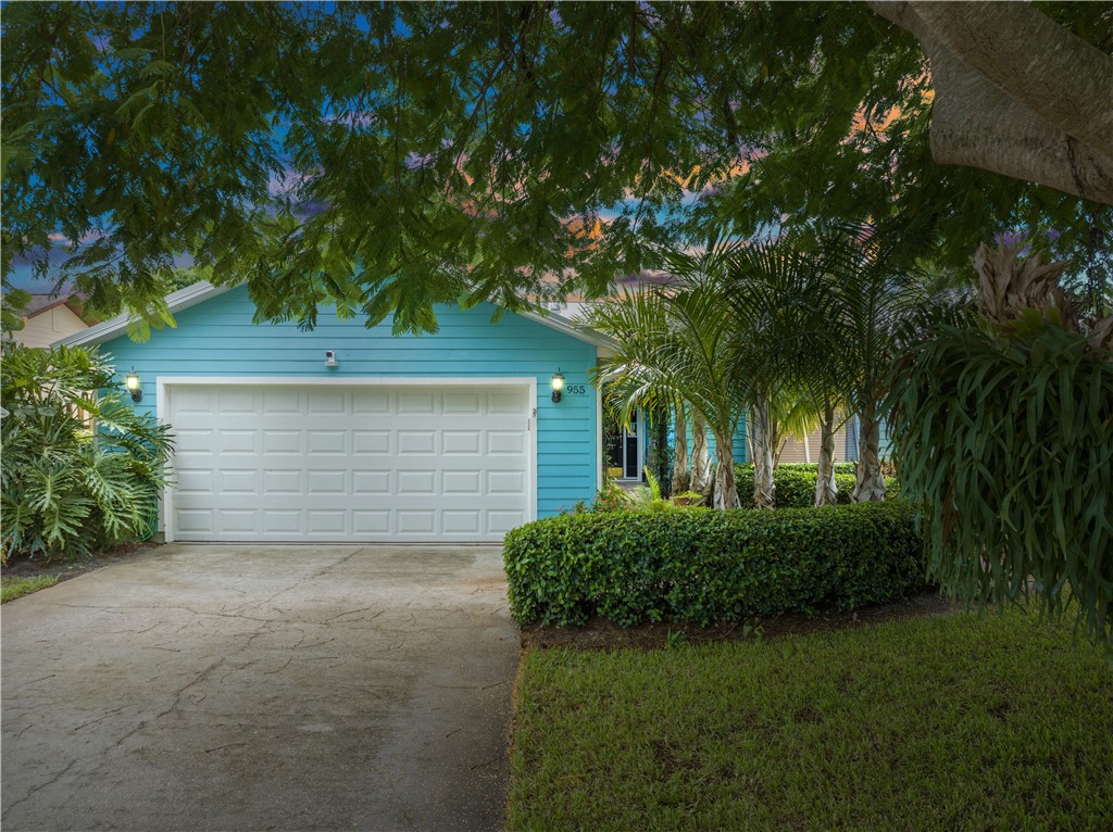 front view of a house with a small yard