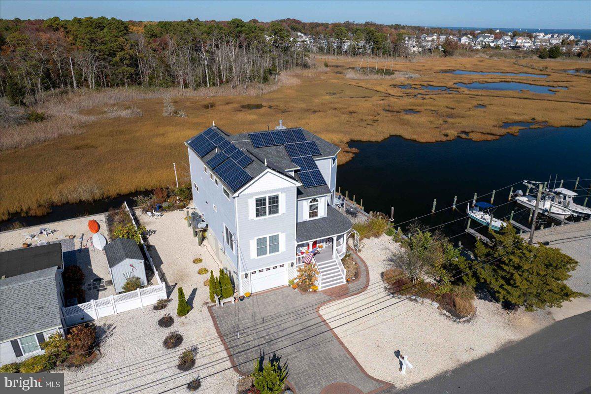 a view of a house with ocean view