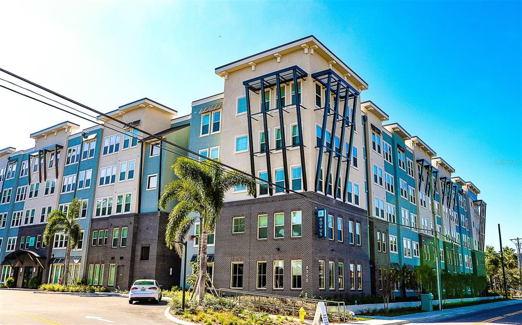 a view of a building with a street