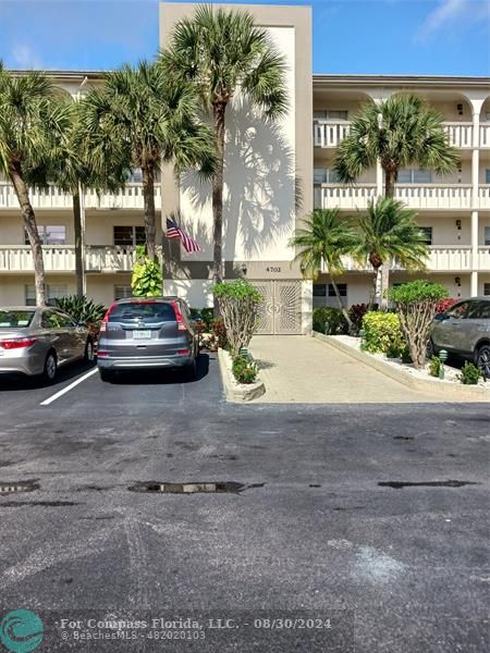 a cars parked in front of a building