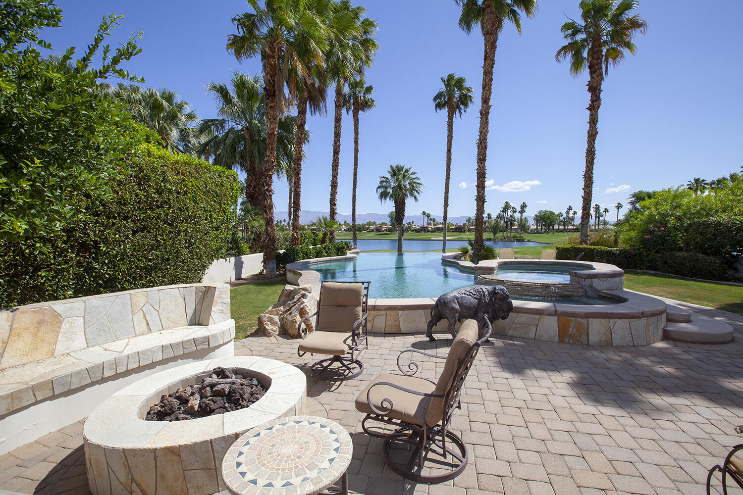 a view of outdoor space with patio furniture and swimming pool