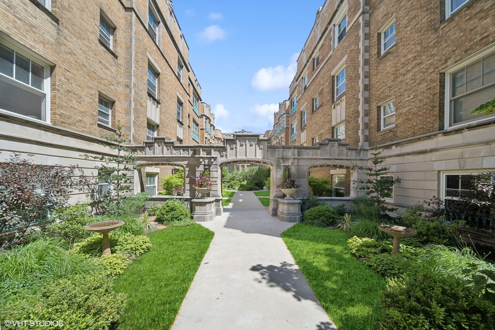 a view of a building with a garden