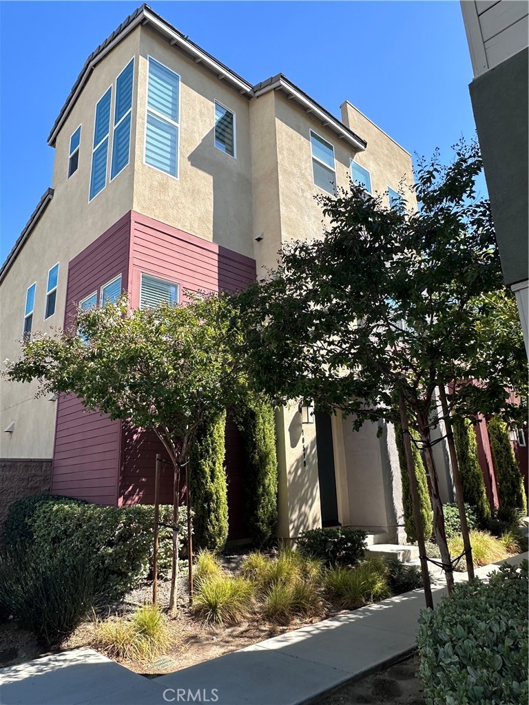 a front view of a house with yard