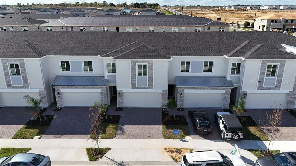 an aerial view of a house with sitting space