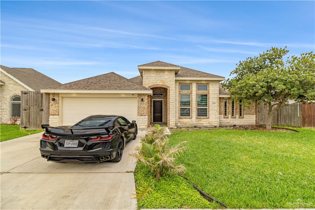 a car parked in front of a house