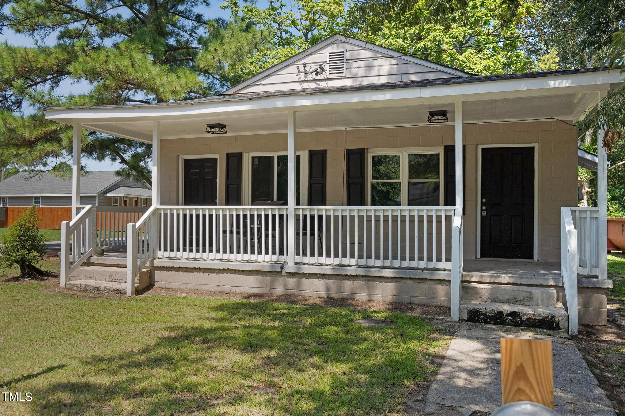 a front view of a house with a porch