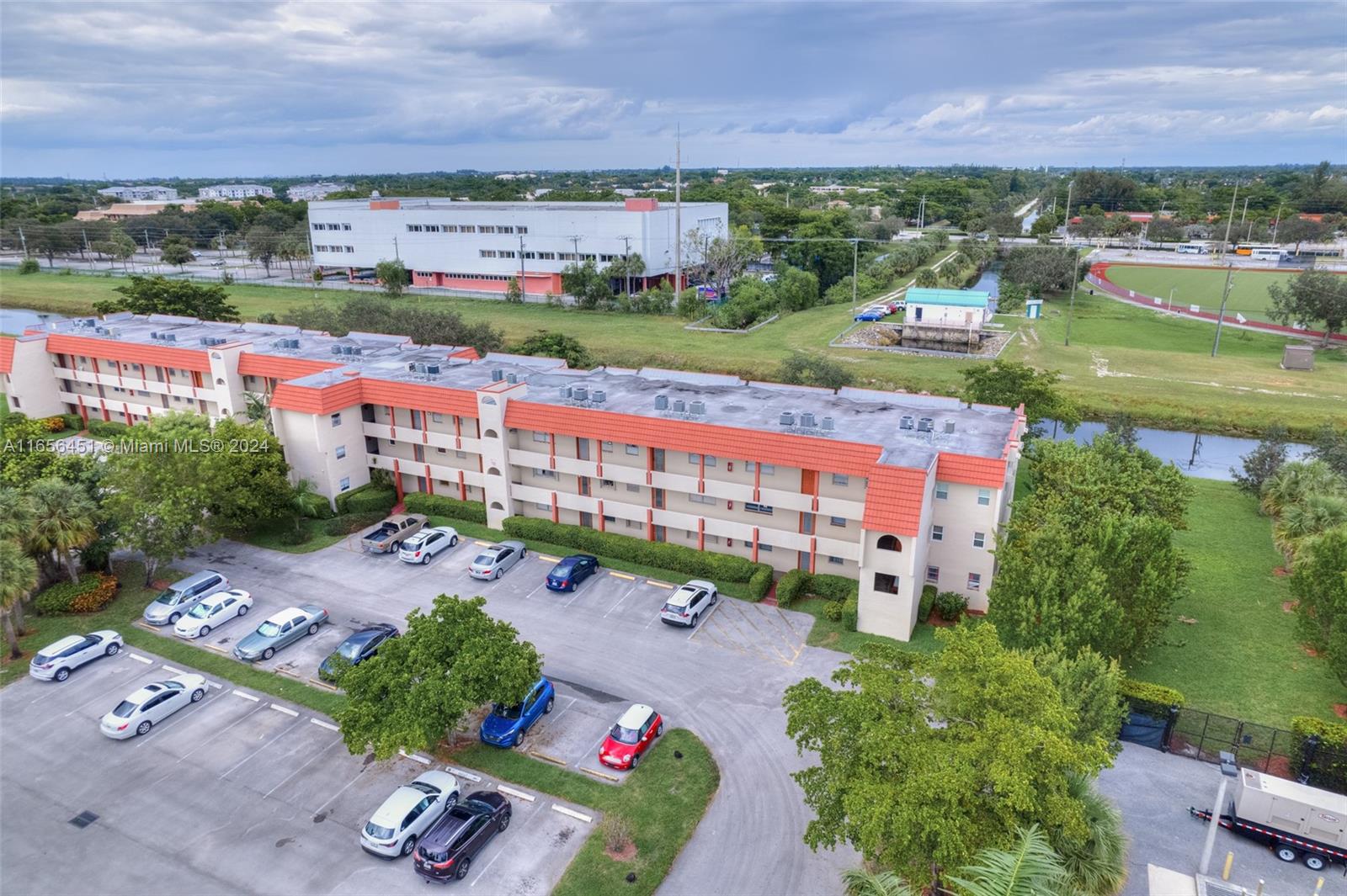 an aerial view of a houses with outdoor space