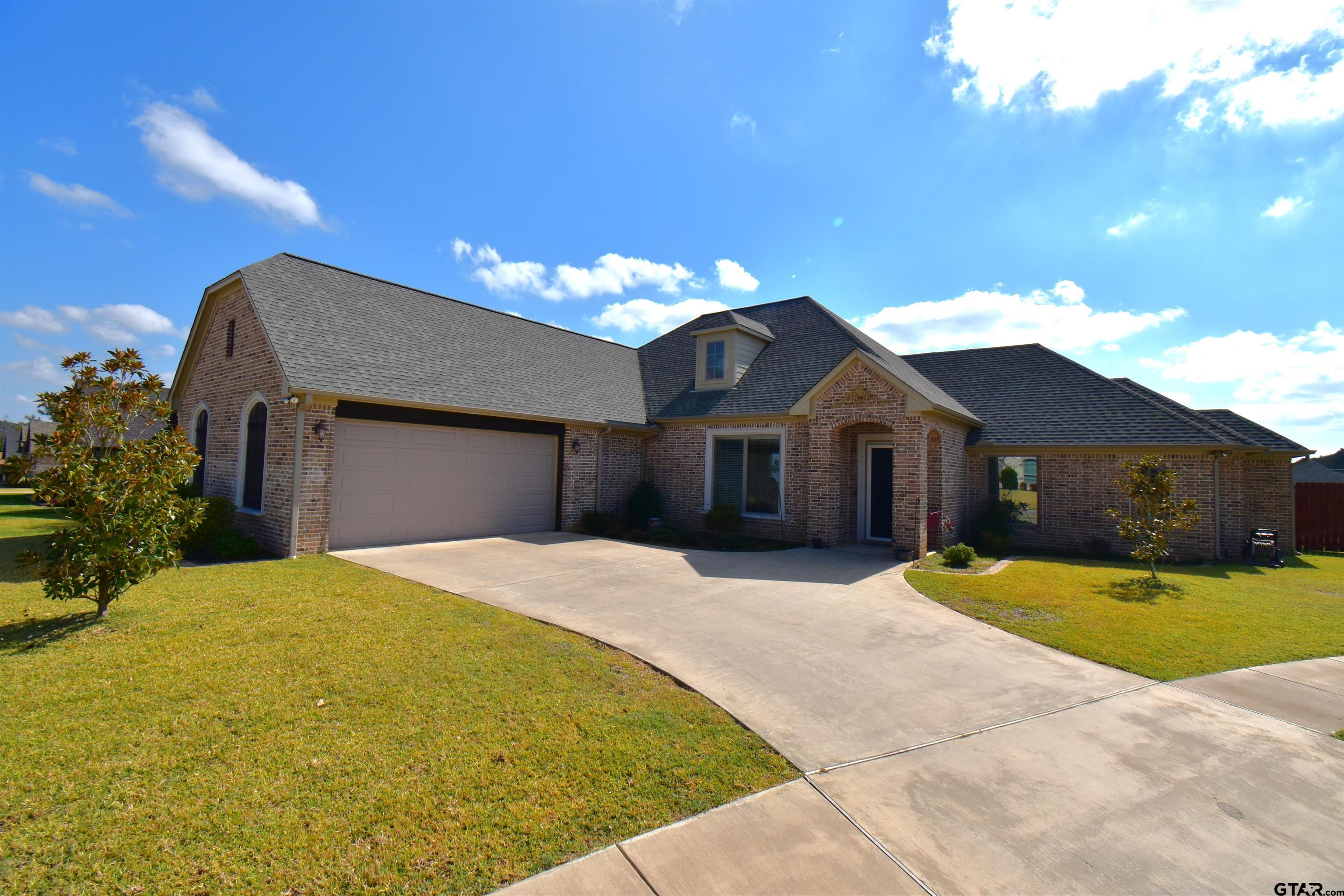 a house view with a outdoor space