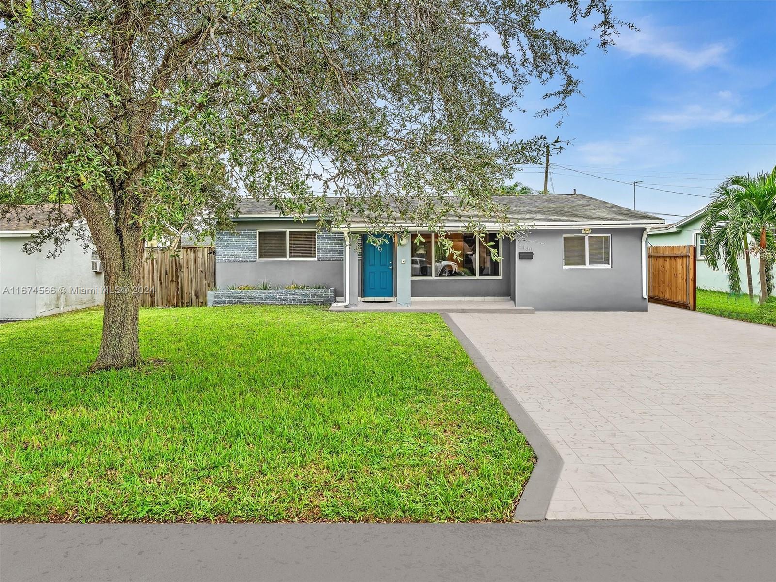 front view of a house with a yard