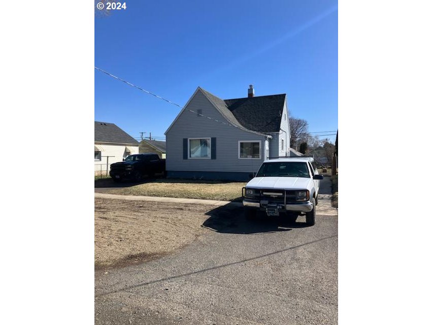 a car parked in front of a house