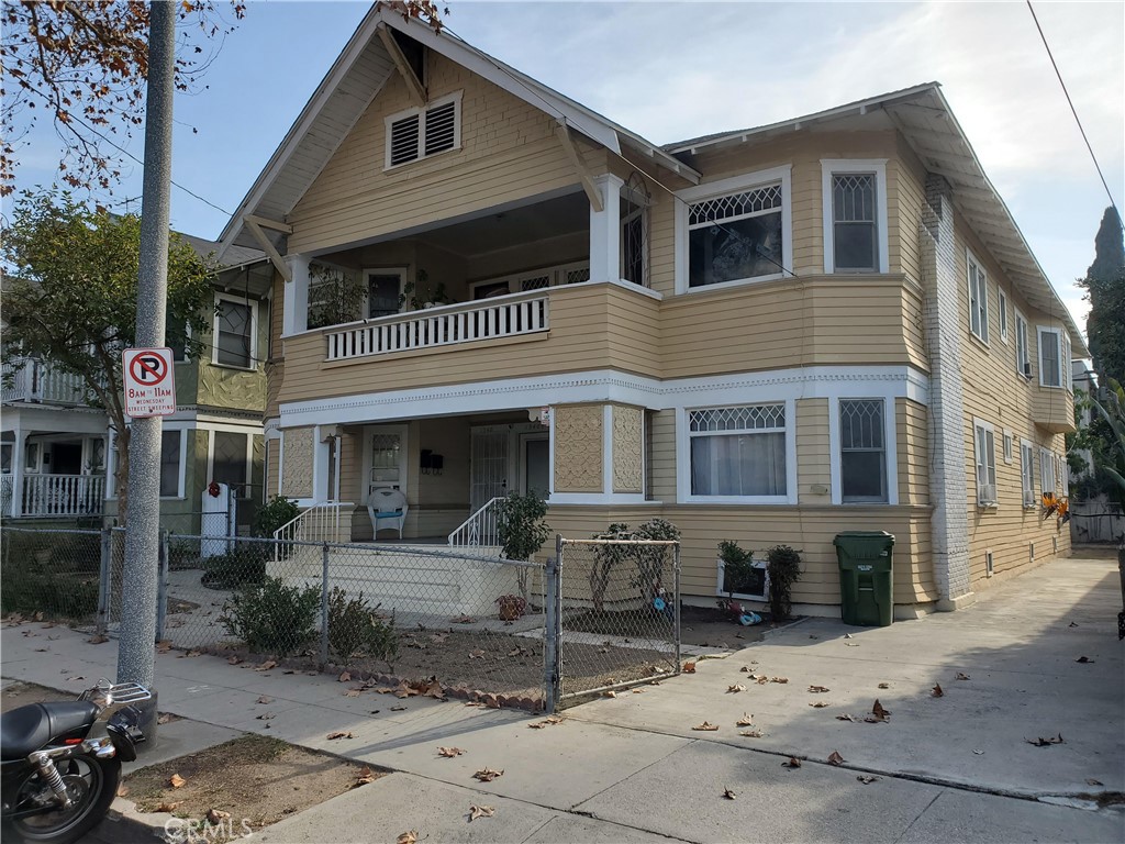 a front view of a house with yard