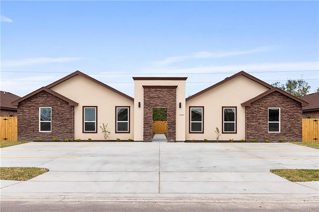 a front view of house with yard