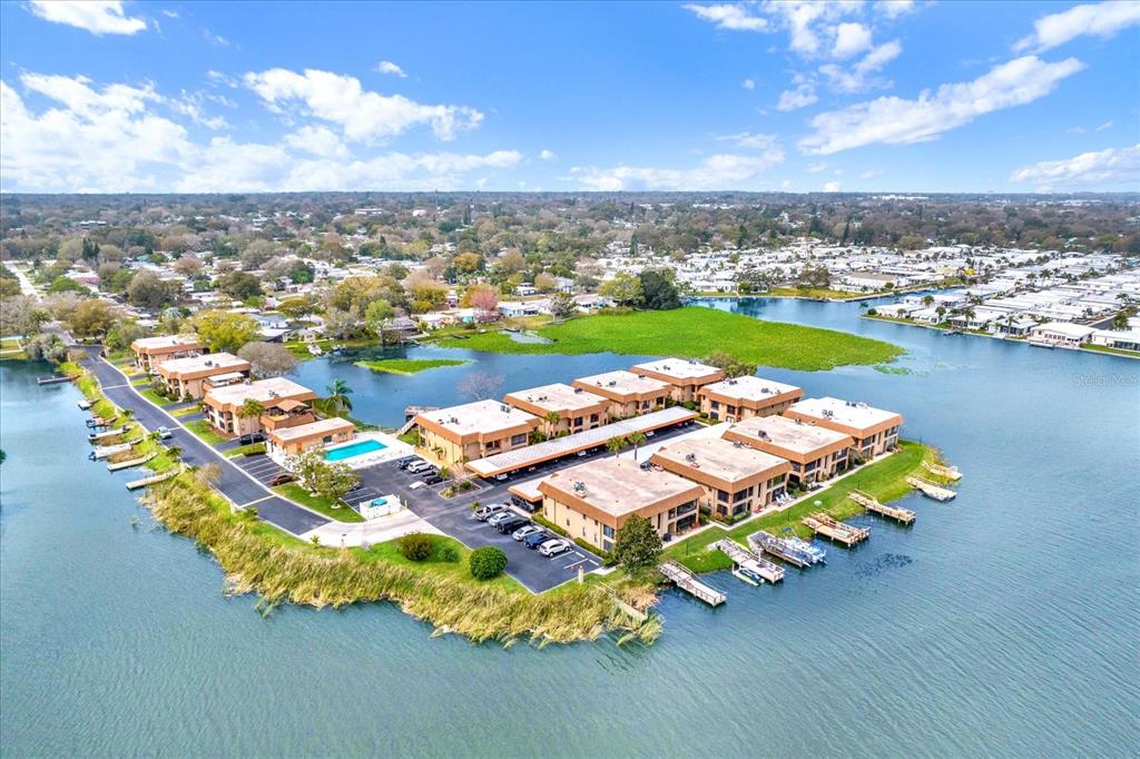 an aerial view of a house with a ocean view