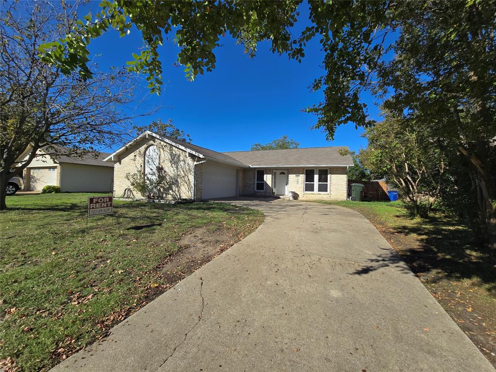 a house with trees in the background