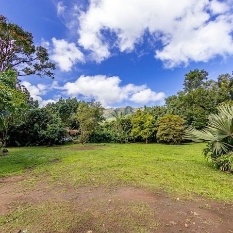 a view of a lake with a big yard