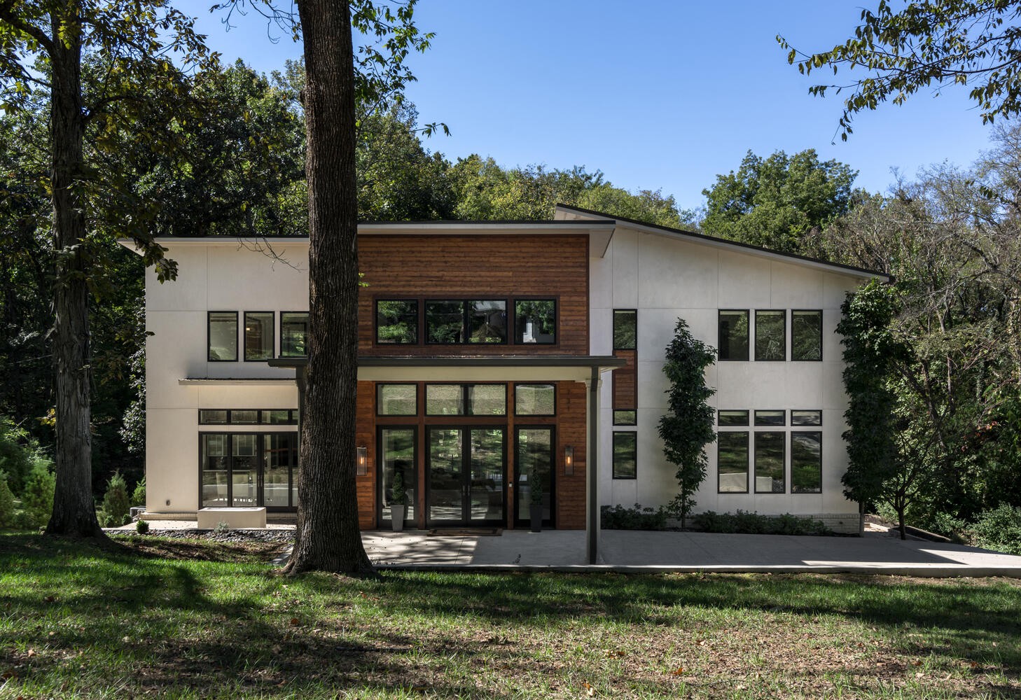 front view of a house with a yard