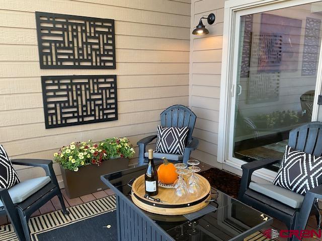 a table and chairs in a patio