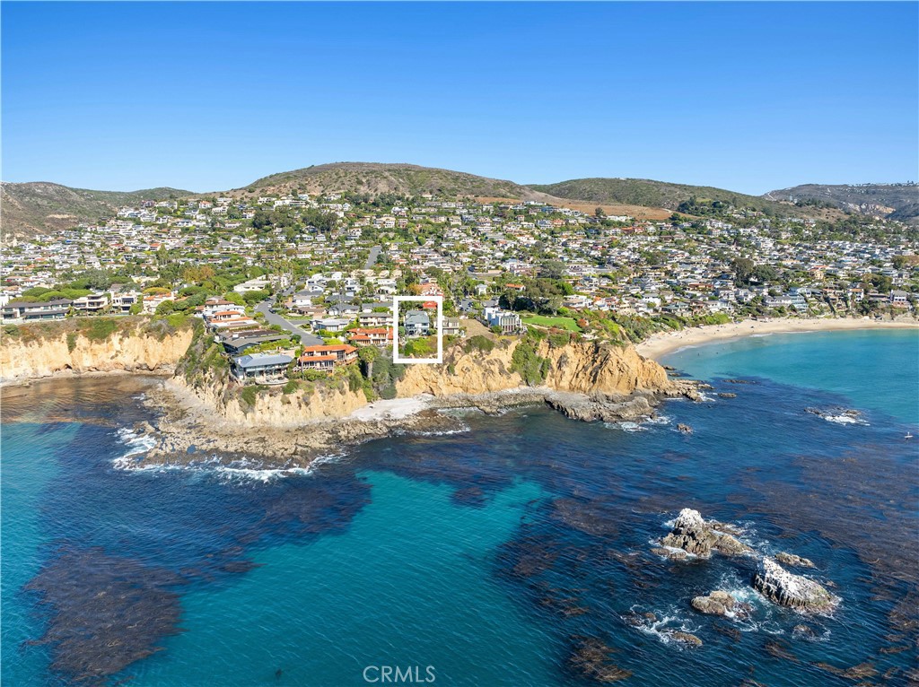 a view of a city with an ocean