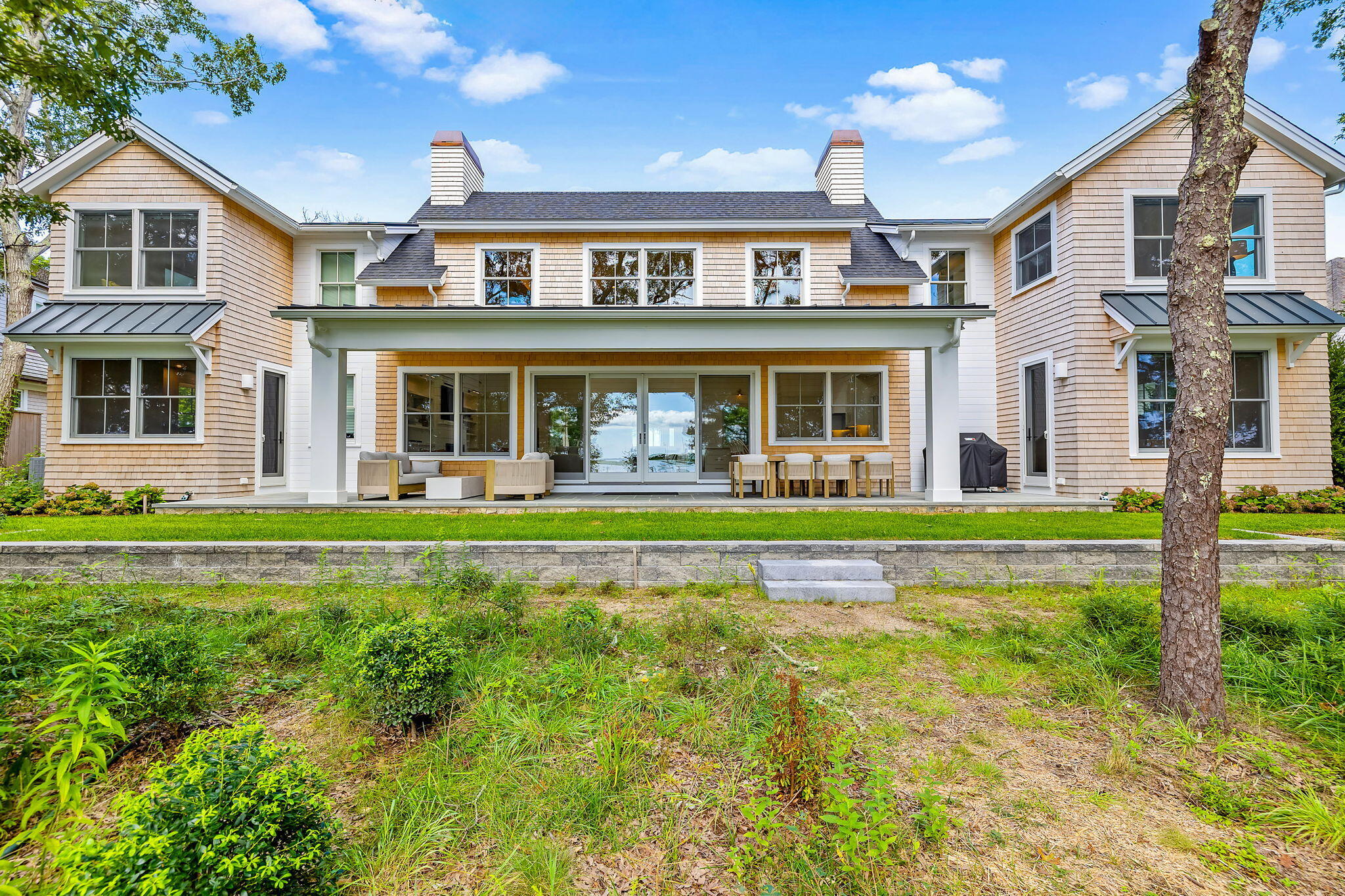 front view of a house with a swimming pool