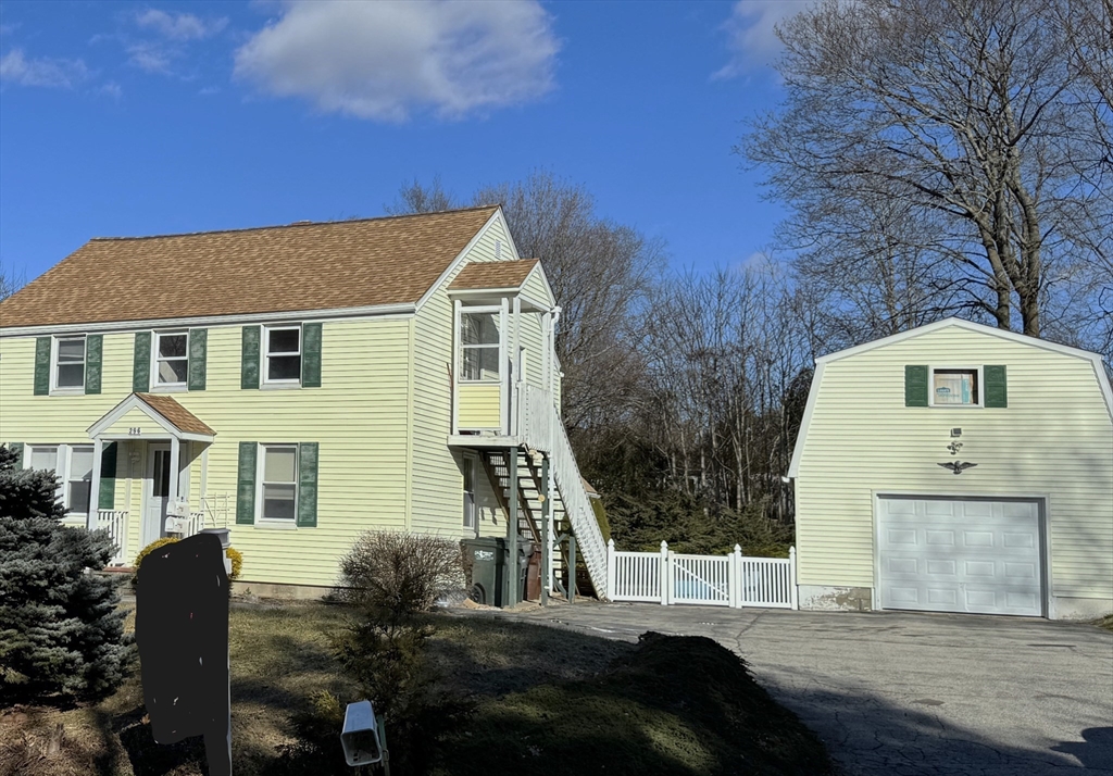 a front view of house with yard