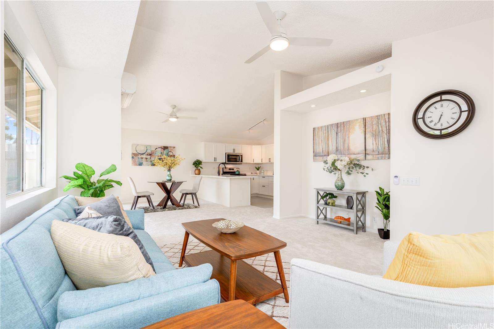 a living room with furniture and a table