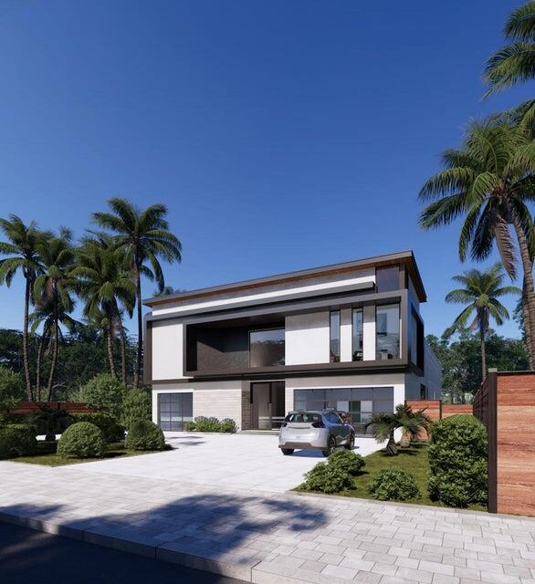 a front view of a house with porch and outdoor seating