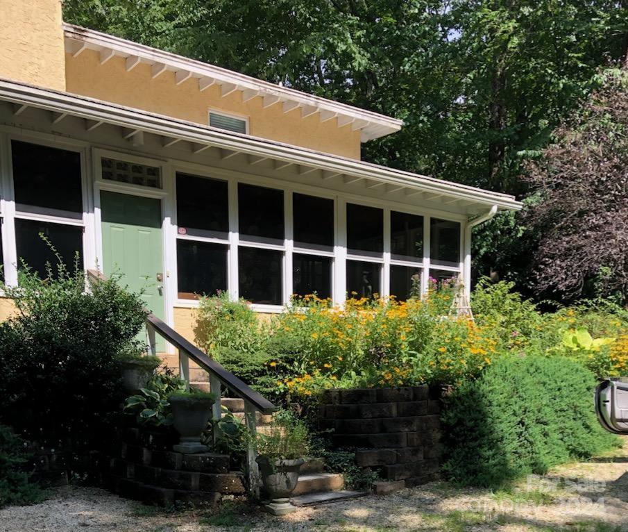 a house view with a garden space