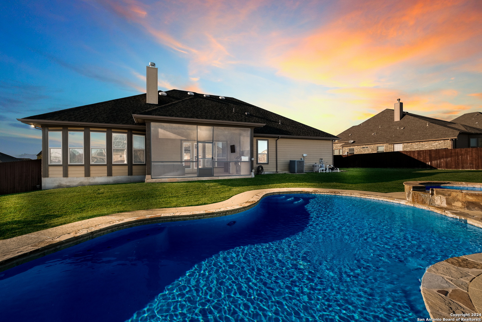 a view of a house with a swimming pool