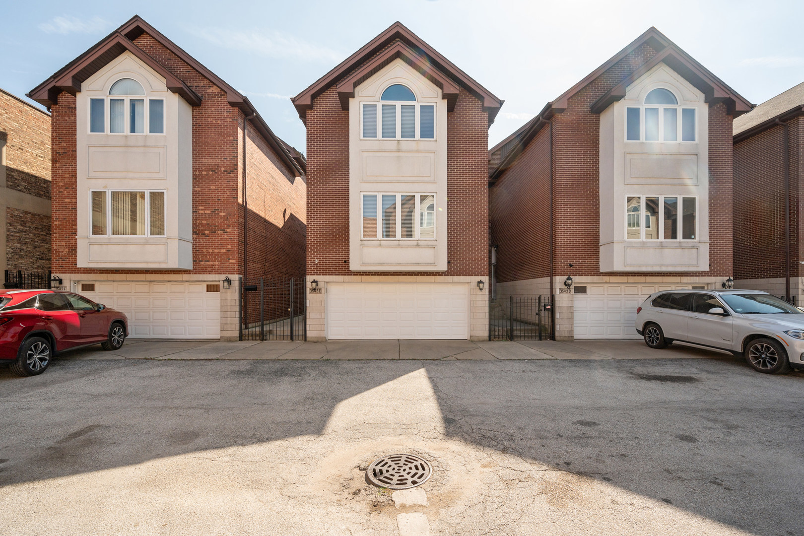 a view of a car park in front of a house