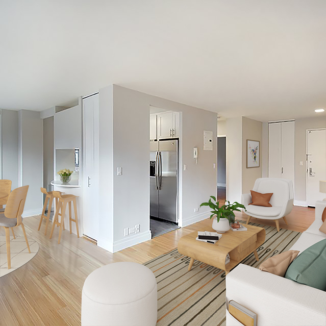 a living room with furniture and a table